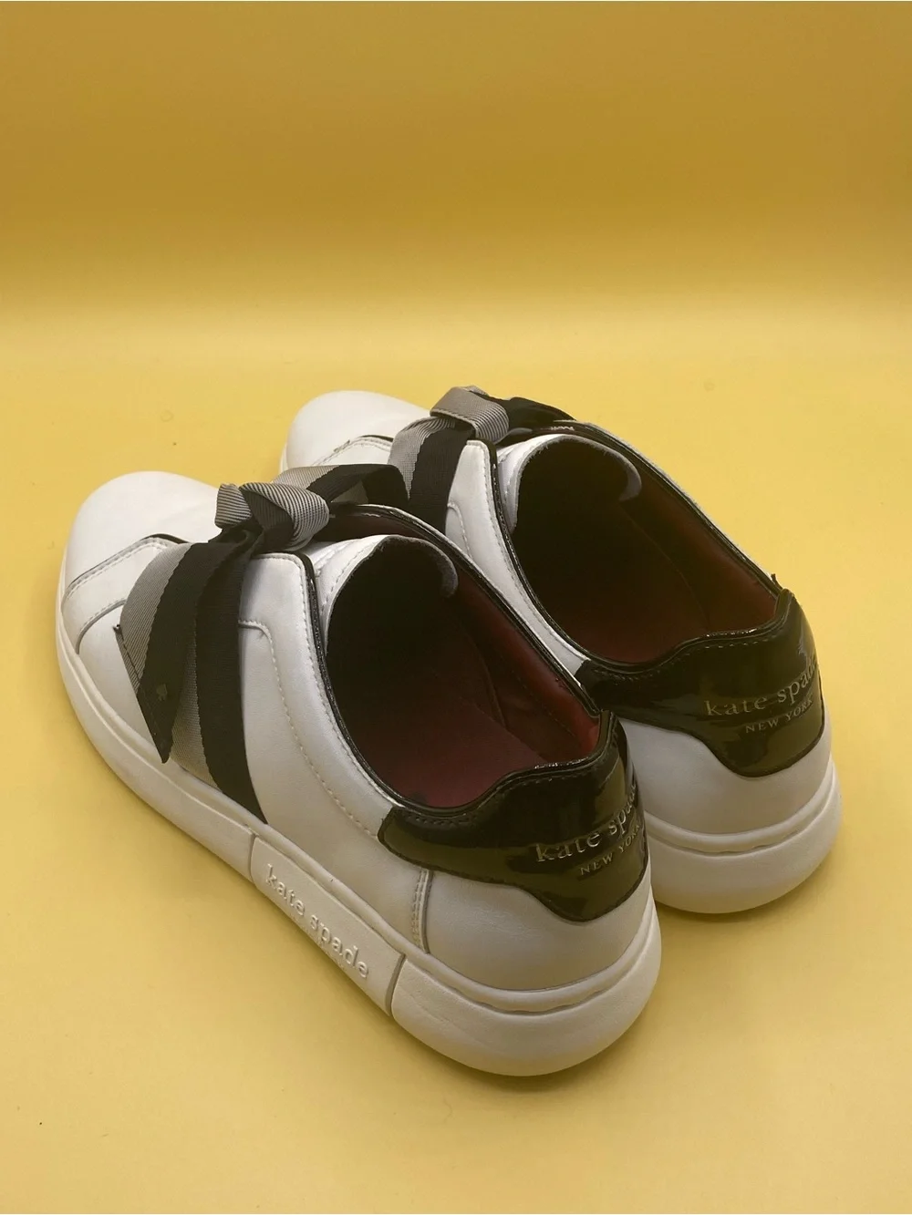 kate spade White Leather Sneakers with Black and Gray Ribbon Bow
